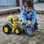 Traktor med skopa gigant
