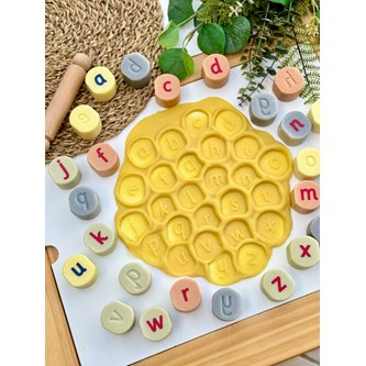 Alfabetsstämplar i sten, gemena