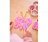 Dekorera en fjäril av lera