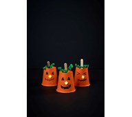 Lysande pumpa av pappmugg